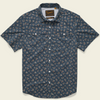 Floral patterned shirt on a beige background