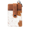 Brown and white cowhide phone card holder with leather strap on a white background