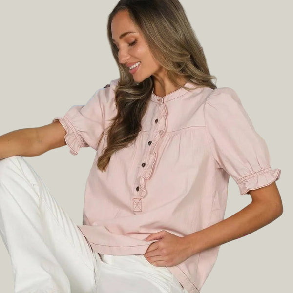 Woman in a pink blouse and 