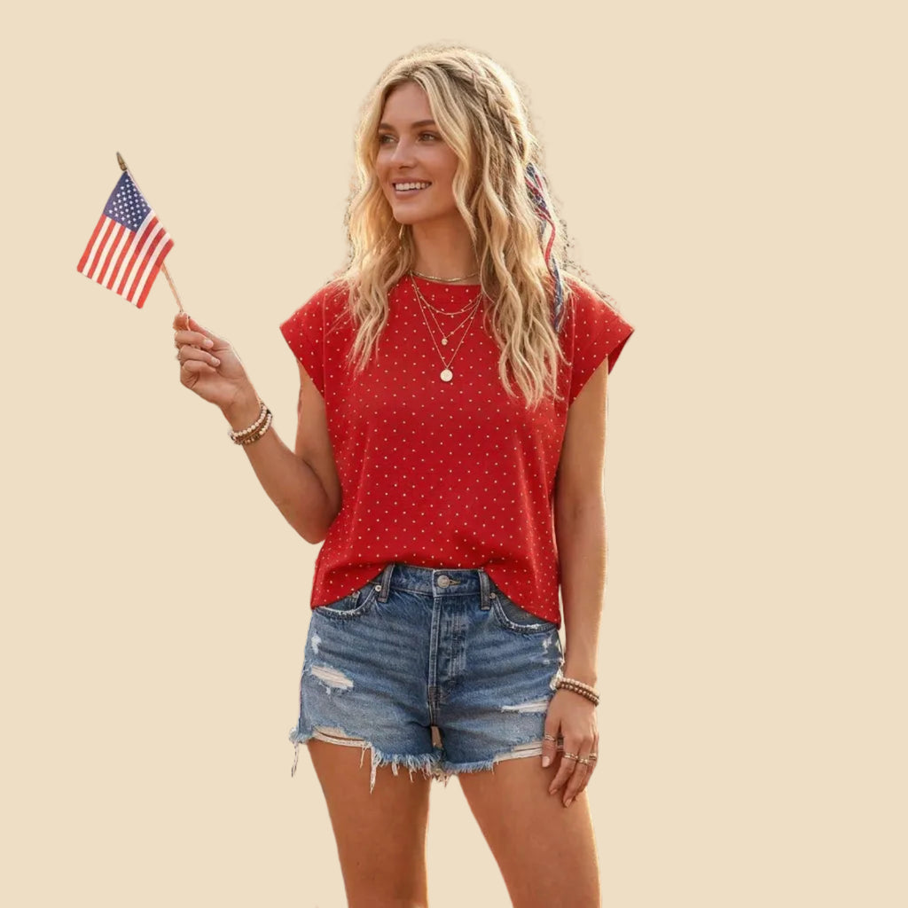 Woman in a red top and denim shorts 