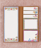 Floral design notepad with tear-off pages on a textured brown background