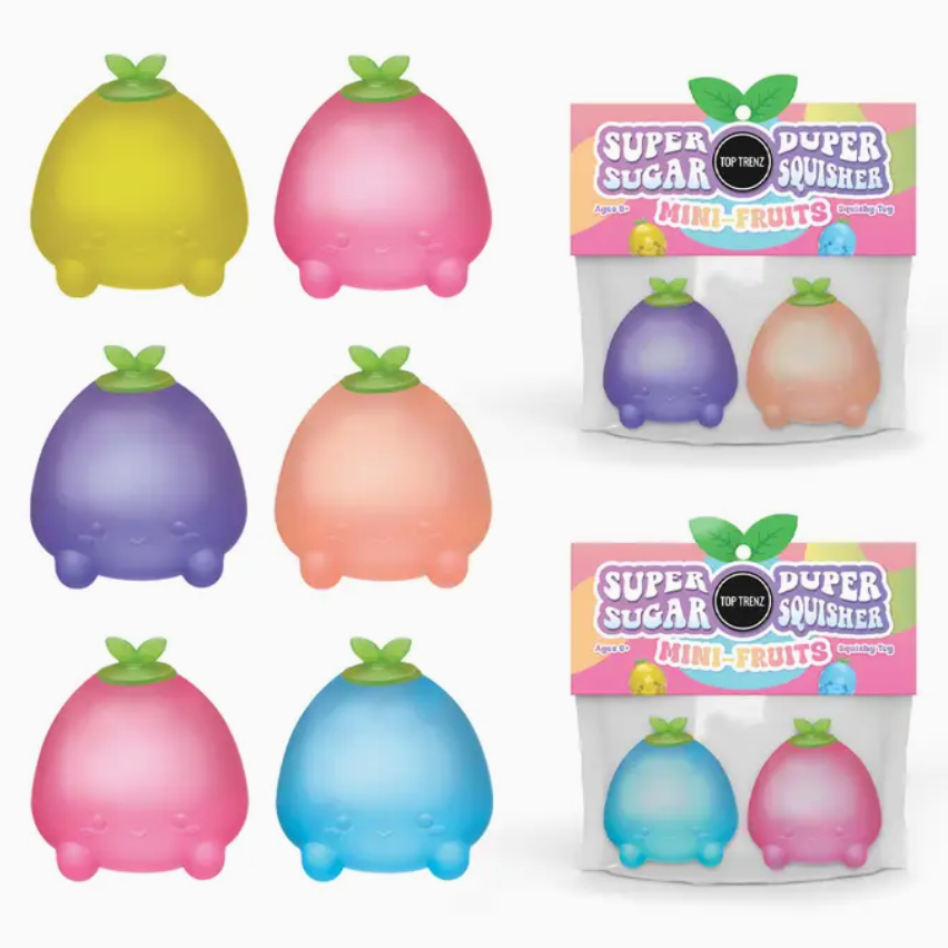 Six mini squishy fruit toys in pastel colors are shown, with two packages of the same set on the right. The toys have rounded bodies and small green leaf-like tops.
