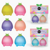 Six mini squishy fruit toys in pastel colors are shown, with two packages of the same set on the right. The toys have rounded bodies and small green leaf-like tops.