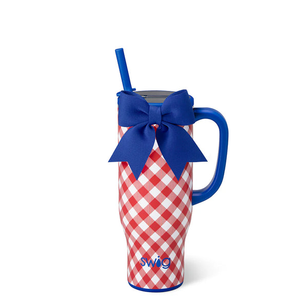 Red and white checkered mug with blue handle and bow, featuring the Swig brand logo.