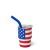 Tumbler with American flag design and blue straw on a white background