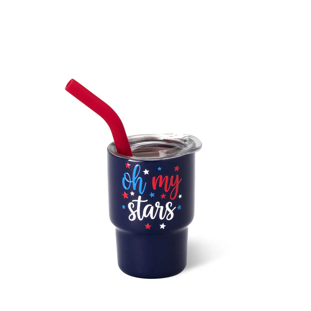 Navy blue tumbler with 'oh my stars' text and red straw on a white background