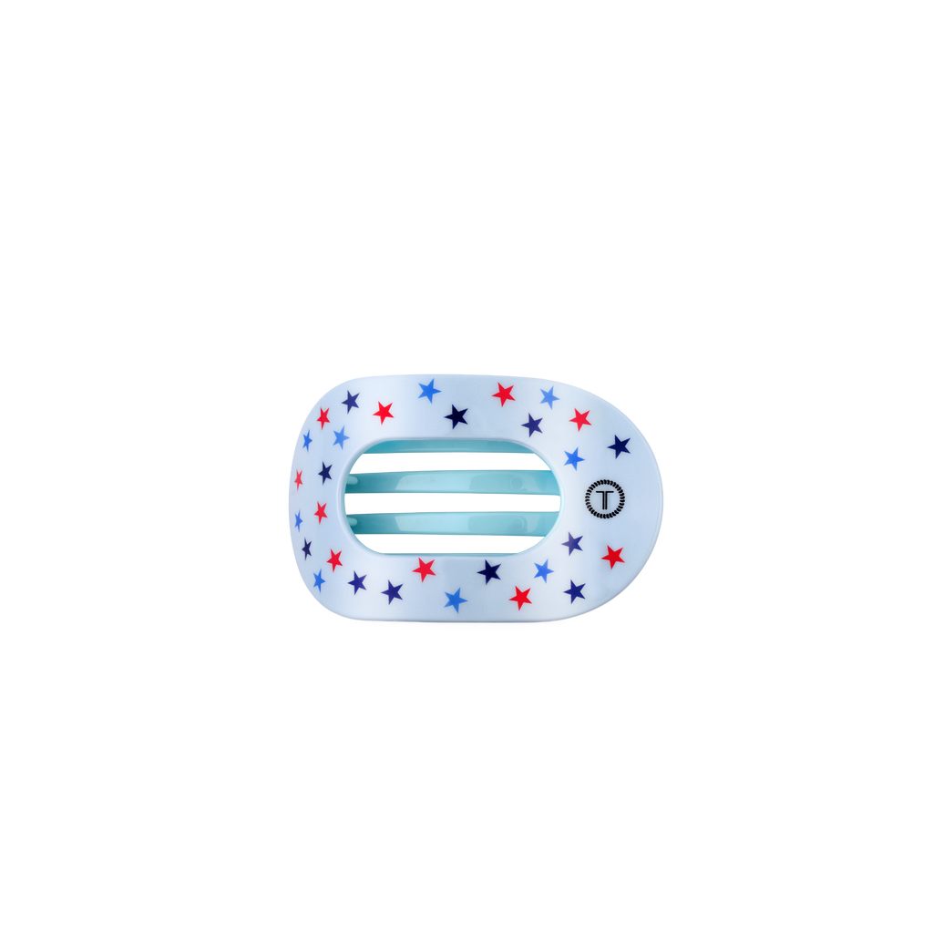 Decorative hair clip with star pattern on a white background
