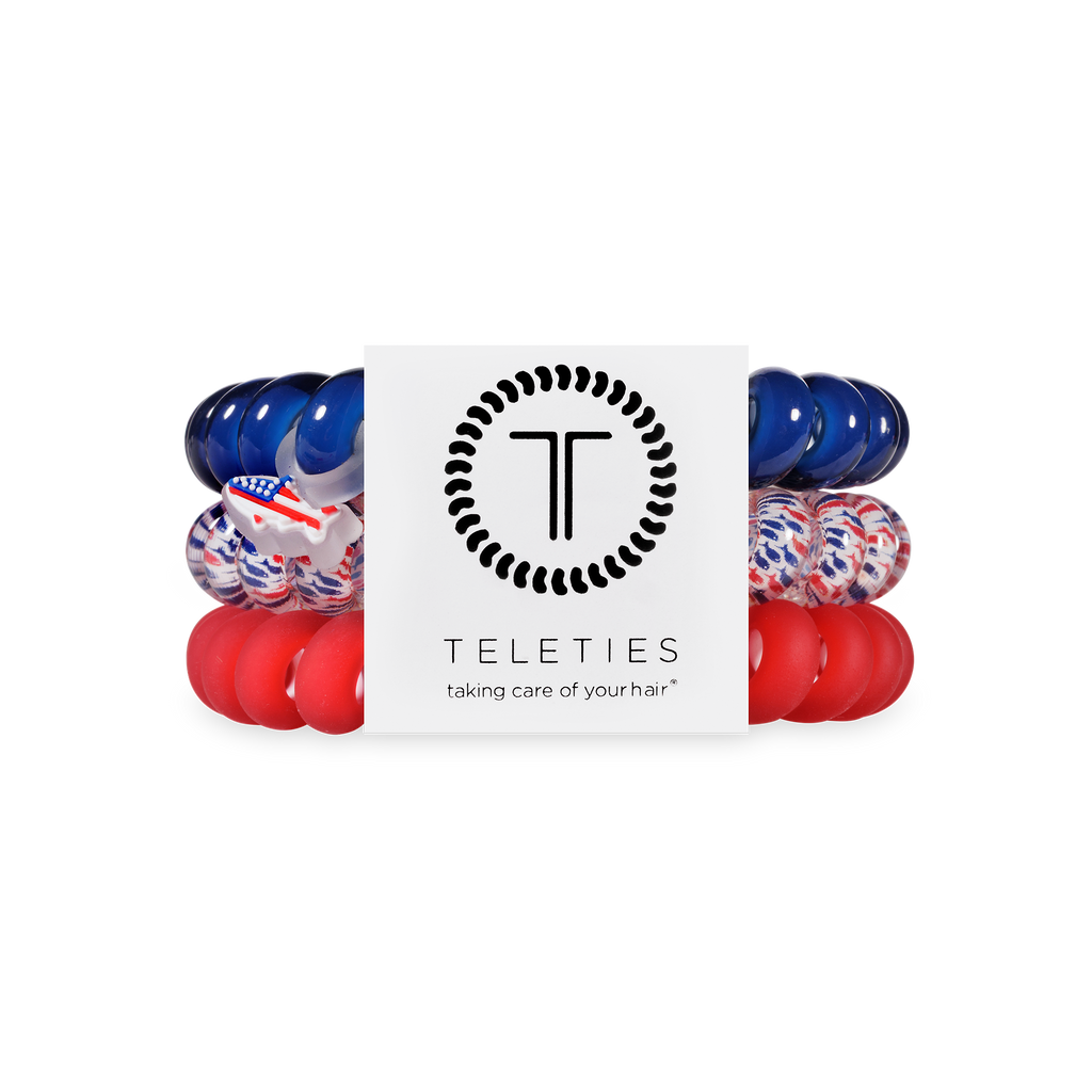 Set of hair ties in red, blue, and white with 'Teleties' packaging on a white background.