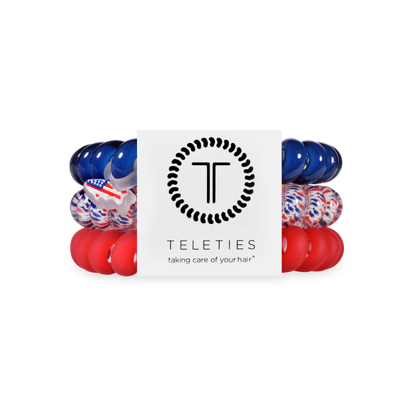 Set of hair ties in red, blue, and white with 'Teleties' packaging on a white background.
