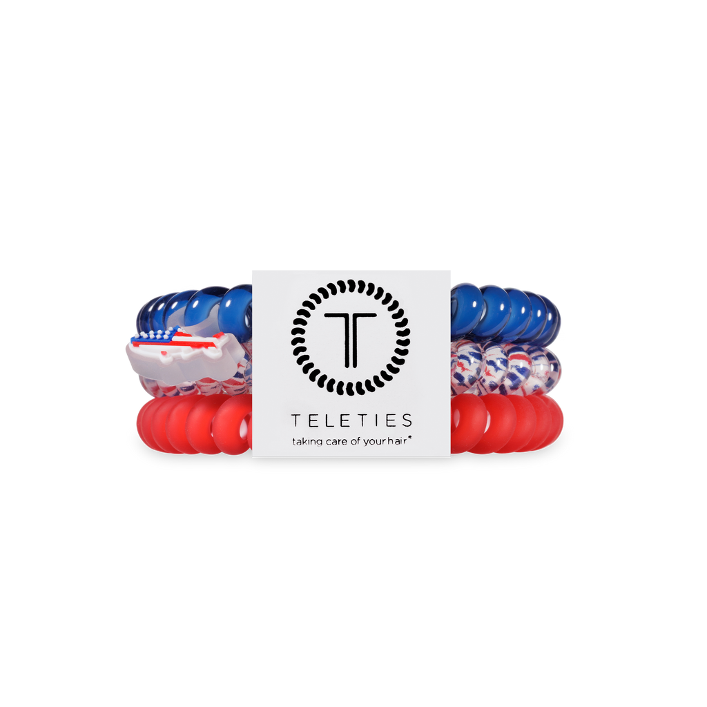 Set of hair ties with American flag design and 'Teleties' branding on a white background
