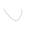 Simple pearl necklace on waxed thread against a white background