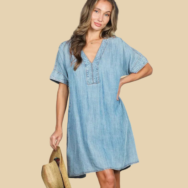 Woman wearing a light blue dress 