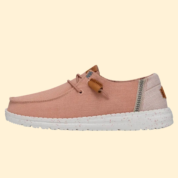 Pink casual shoe with white sole on a transparent background