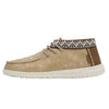 A beige Hey Dude casual shoe with colorful embroidery and a geometric pattern on the collar.