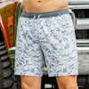 A pair of athletic shorts with a camouflage pattern, predominantly in gray tones, with a drawstring waistband.