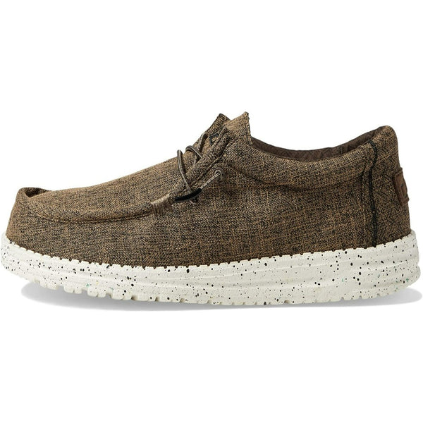 Brown shoe with white sole on a white background