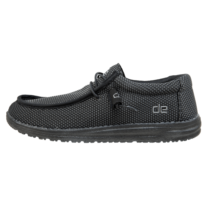Black shoe with textured surface and brand logo on a white background