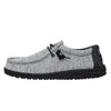 Gray casual shoe with black sole on a white background