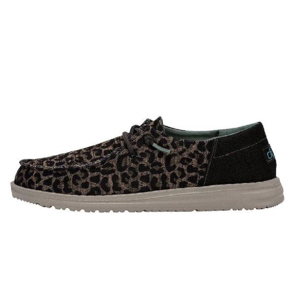Sneaker with leopard print pattern on a white background