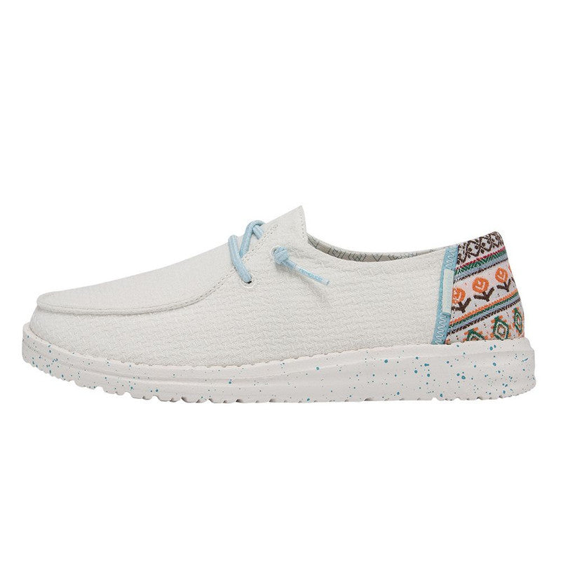 White sneaker with colorful pattern on a white background