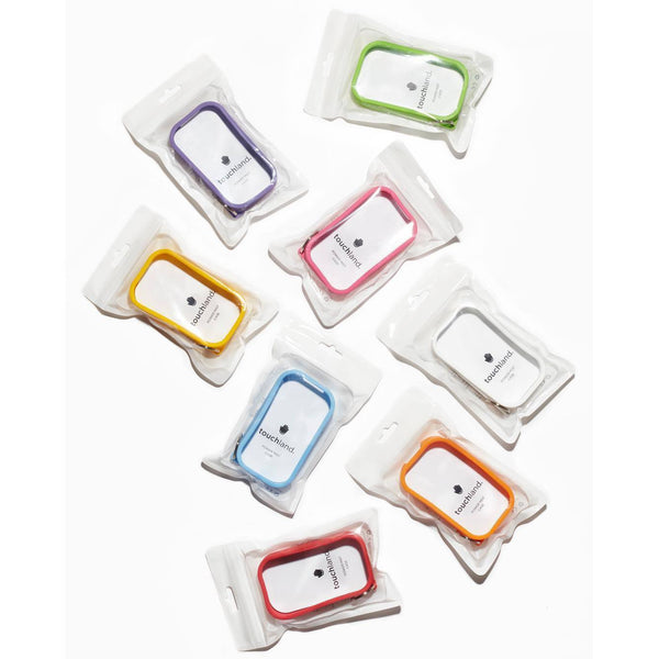 Assorted colored silicone touchland hand sanitizer cases in clear packaging on a white background